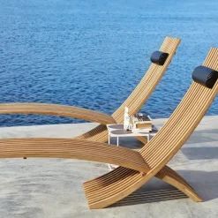 Skargaarden Seating*Nozib lounge chair, Teak, black neck rest in leather Brown