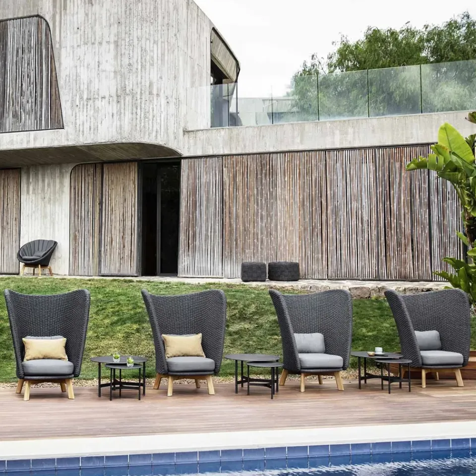 Cane-line Outdoor Lounge Furniture*Peacock Highback lounge armchair, Natté dark , incl. cushions, legs in teak Grey