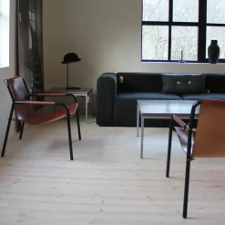 OX Denmarq Armchairs & Footstools*September lounge chair, Leather . laquered steelstand Black